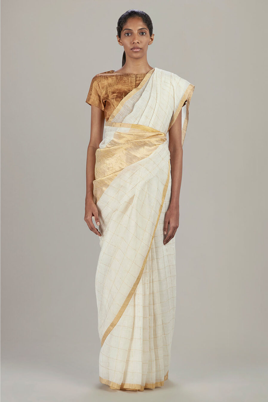 Anavil Golden checkered ivory sari
