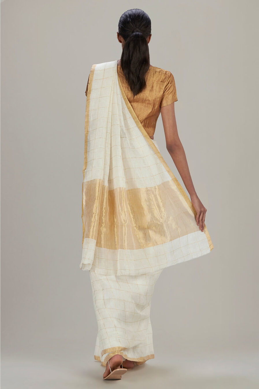 Anavil Golden checkered ivory sari