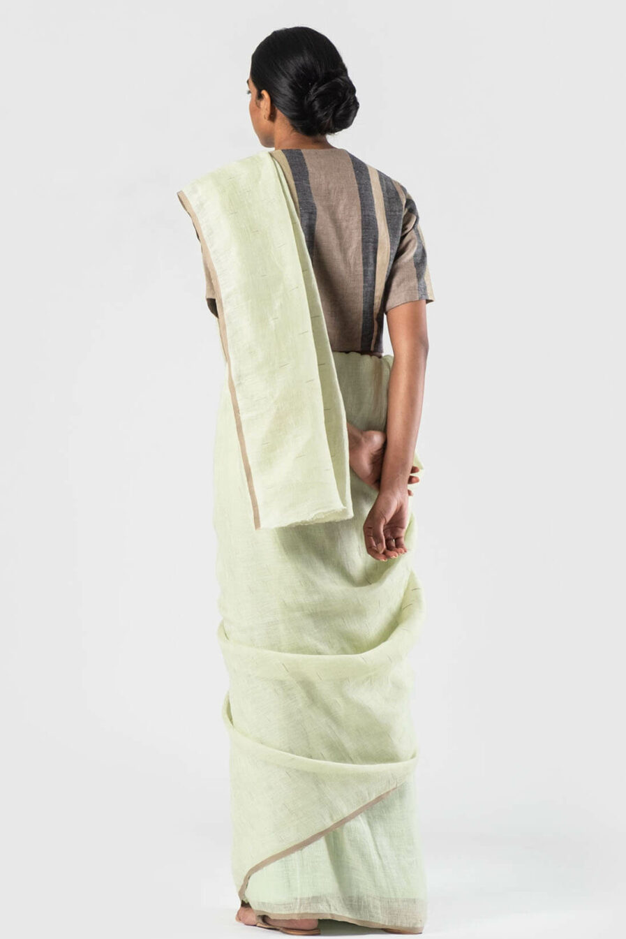 Anavila Pista green Linen slub detail sari