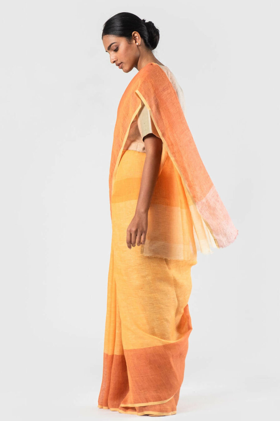 Anavila Tan and tangerine linen sari